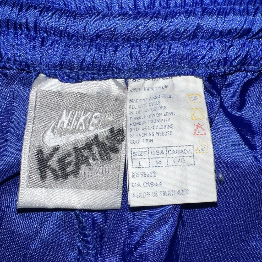 VTG Nike Windbreaker Track Pants Youth Sz L (14) Blue Ankle Zip Nylon Jogger 90s